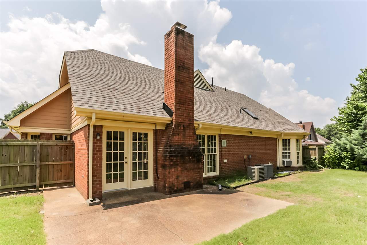 8516 Buckhurst Road Memphis, TN 38016 - Photo 25 of 25 The fenced backyard features a large patio perfect for cookouts and parties!