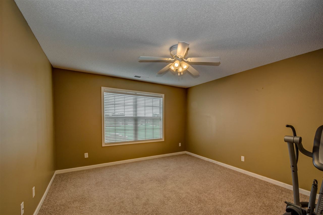 8 Eagle Trace Road Covington, TN 38019 - Photo 18 of 25 Upstairs With Shared Bathroom and Carpet.