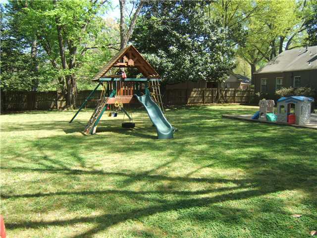 5098 North Angela Road Memphis, TN 38117 - Photo 11 of 11 Beautiful, fenced backyard. Wonderful playground area.