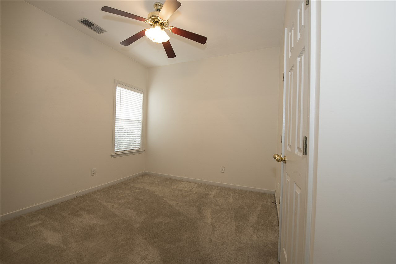 1237 Misty Isle Drive Memphis, TN 38103 - Photo 13 of 22 3rd bedroom is located in the rear of the home and has a large closet. At the opposite end of the home from the master bedroom.