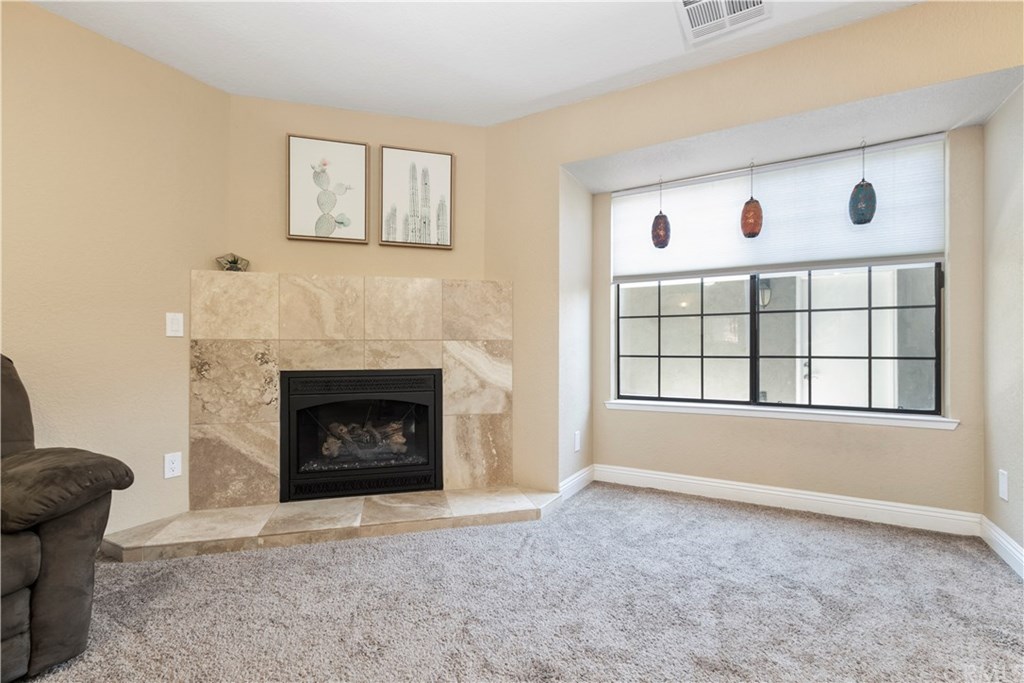 628 4th Street Paso Robles, CA 93446 - Photo 4 of 22 Gas Fireplace with tile hearth