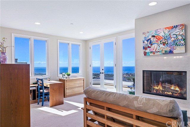 625 Avenida Acapulco San Clemente, CA 92672 - Photo 30 of 48 ONE OF THE BEST SPOTS IN THE HOUSE: USE AS YOUR HOME OFFICE, WORKOUT AREA OR MASTER SUITE LOUNGE. OPENS UP TO THE LARGE MASTER BALCONY.