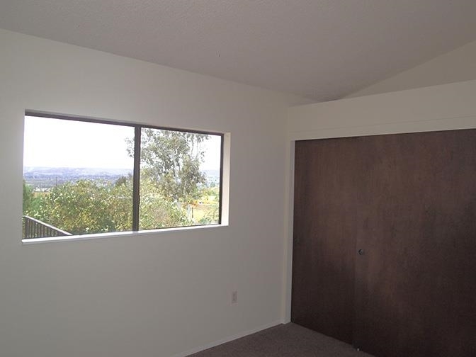 9077 Westhill Road Lakeside, CA 92040 - Photo 13 of 18 Notice the bedrooms have wood sliding closet doors. There are fairly large closets in all bedrooms.
