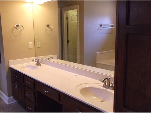 14 Eagle Trace Road Covington, TN 38019 - Photo 13 of 20 Master Bath has Double Sinks, Whirlpool Tub, Sep. Shower, huge closet, and tile floor.