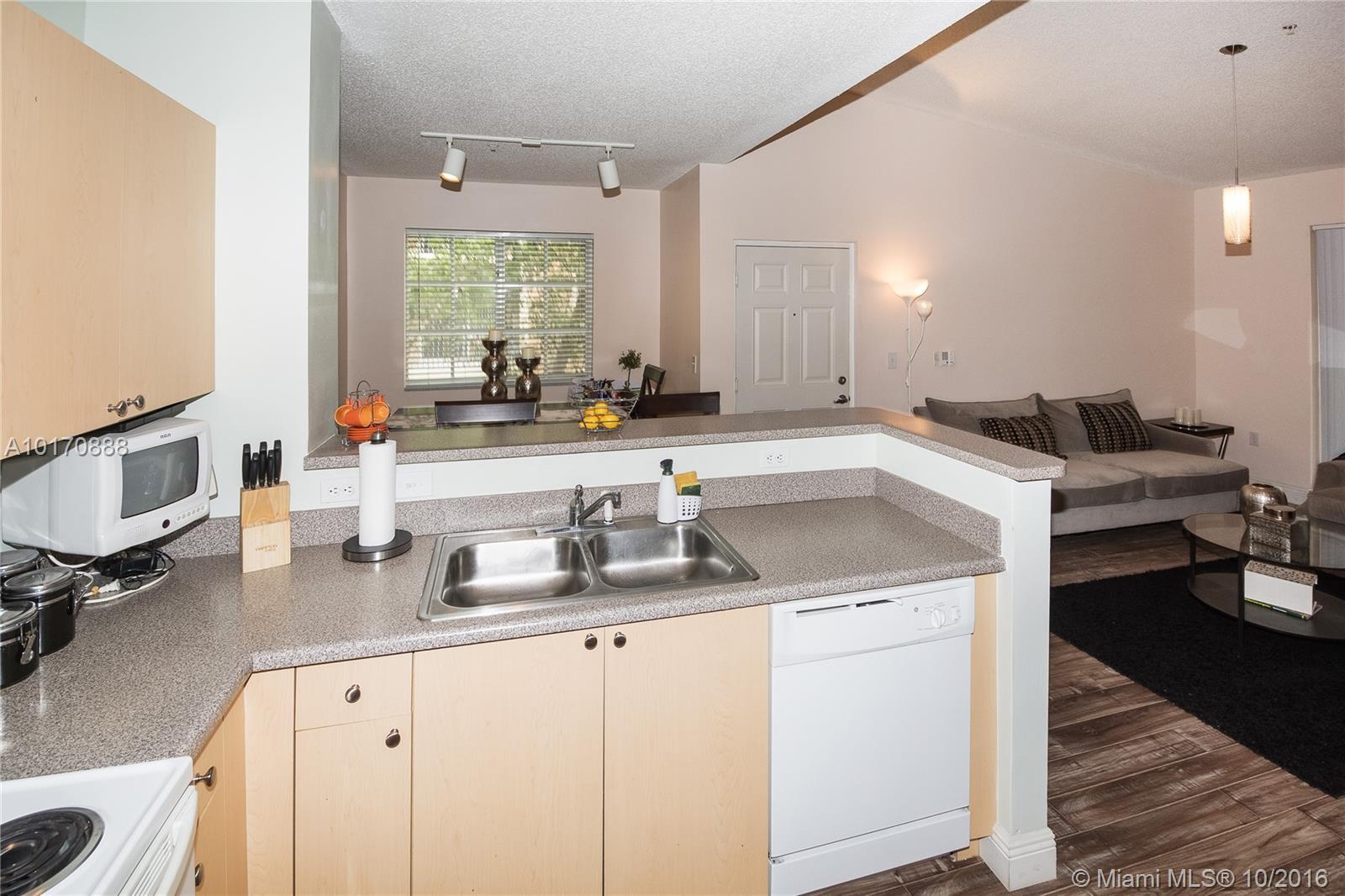 8030 North Nob Hill Road, Unit 207 Tamarac, FL 33321 - Photo 10 of 14