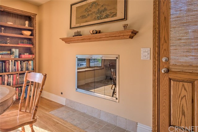 7665 Airlie Drive Tujunga, CA 91042 - Photo 26 of 26 Fireplace in dining area
