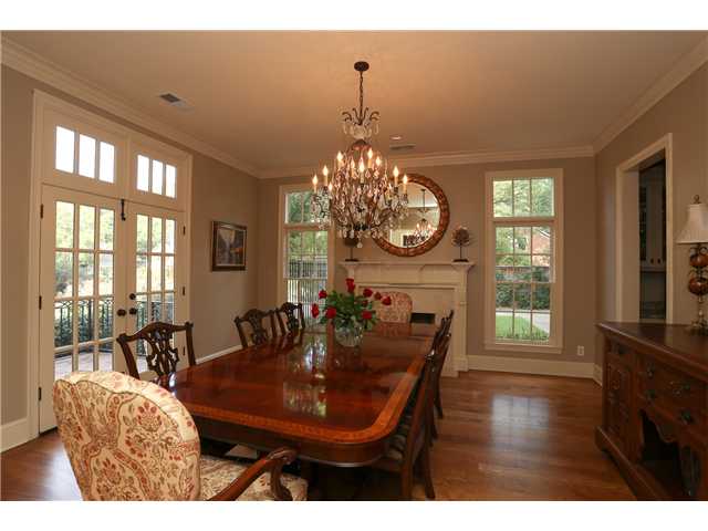 4401 Normandy Road Memphis, TN 38117 - Photo 4 of 21 Fireplace, gleaming wood floors, tall ceilings, show case chandelier and outstanding spacial dimension!