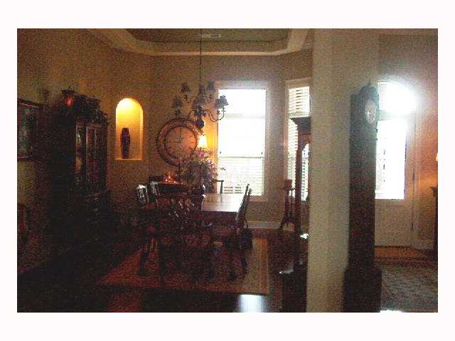 1275 Getwell Road Olive Branch, MS 38632 - Photo 3 of 10 FORMAL DINING ROOM WITH NICHES AND BEAUTIFUL HARDWOOD FLOORING.