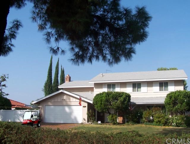 1115 Country Club Drive Riverside, CA 92506 - Photo 1 of 1 Front view of two story Colonial located close enough to the Canyon Crest Golf course to walk or ride your golf cart.