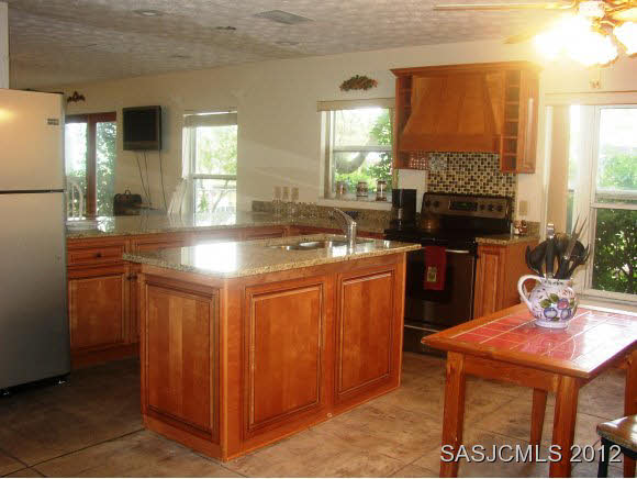 6338 Gomez Road St. Augustine, FL 32080 - Photo 6 of 14 Kitchen Island
