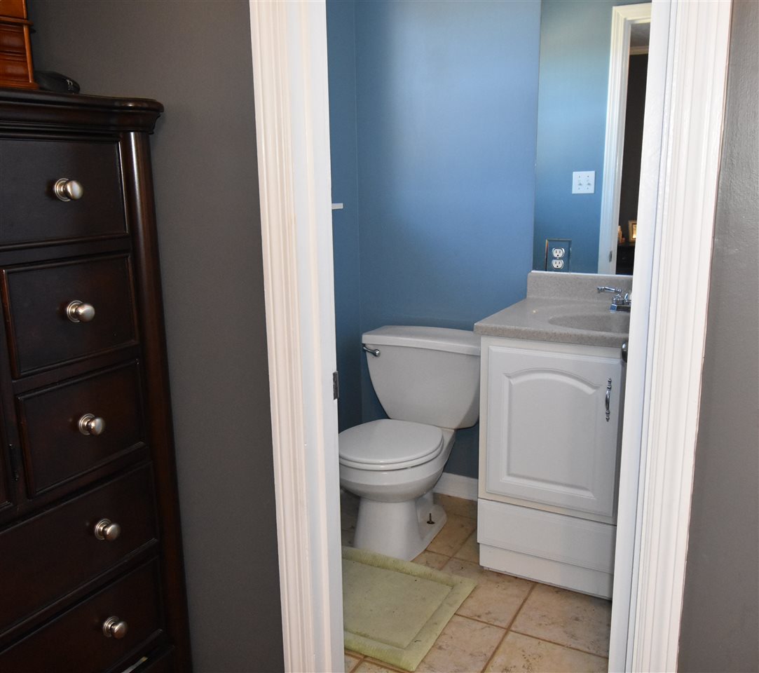 1874 Walnut Grove Road Burlison, TN 38015 - Photo 15 of 24 Half Bath is in the master bedroom.