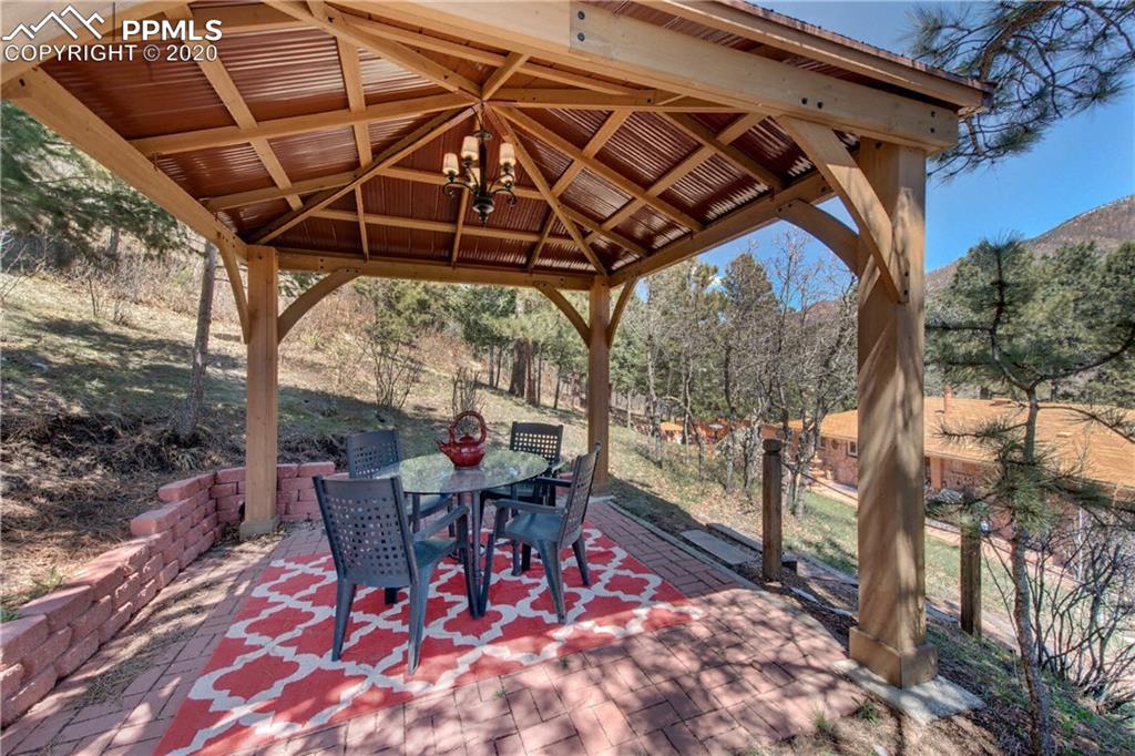 7955 Highway 24 Cascade, CO 80809 - Photo 33 of 36 Pavilion is lighted for entertaining and provides a spectacular view of the surroundings.