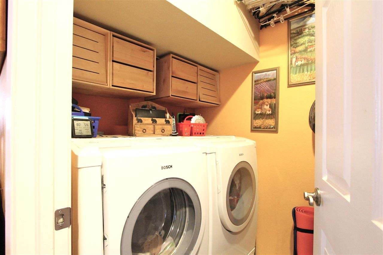 2235 Kings View Circle Spring Valley, CA 91977 - Photo 20 of 25 In unite laundry room with built-in pantry storage