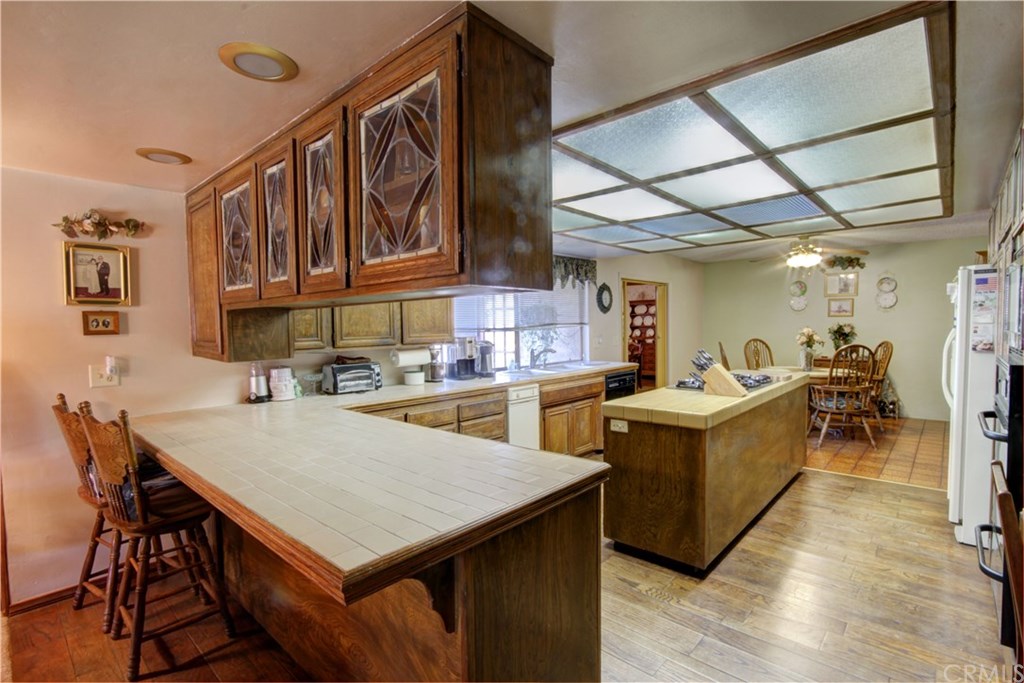 8558 11th Street Downey, CA 90241 - Photo 6 of 26 kitchen opening to living room