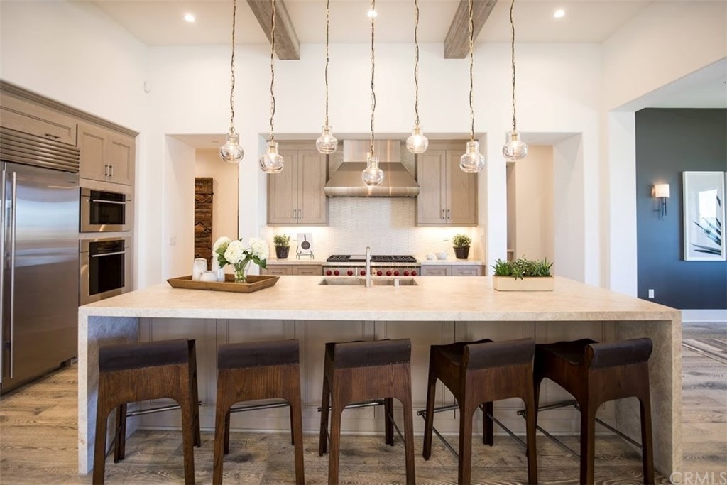 18 Phillips Ranch Road Rolling Hills Estates, CA 90274 - Photo 12 of 12 A2 model home, which is the same floorplan as the home being built at 18 Phillips Ranch Road. Sub-zero refrigerator & built in Wolf Range/double ovens plus a microwave are included.