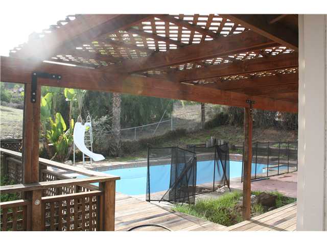 9911 Tangor Way Spring Valley, CA 91977 - Photo 5 of 13 what a great place to create endless memories with kids, with pool and a deck