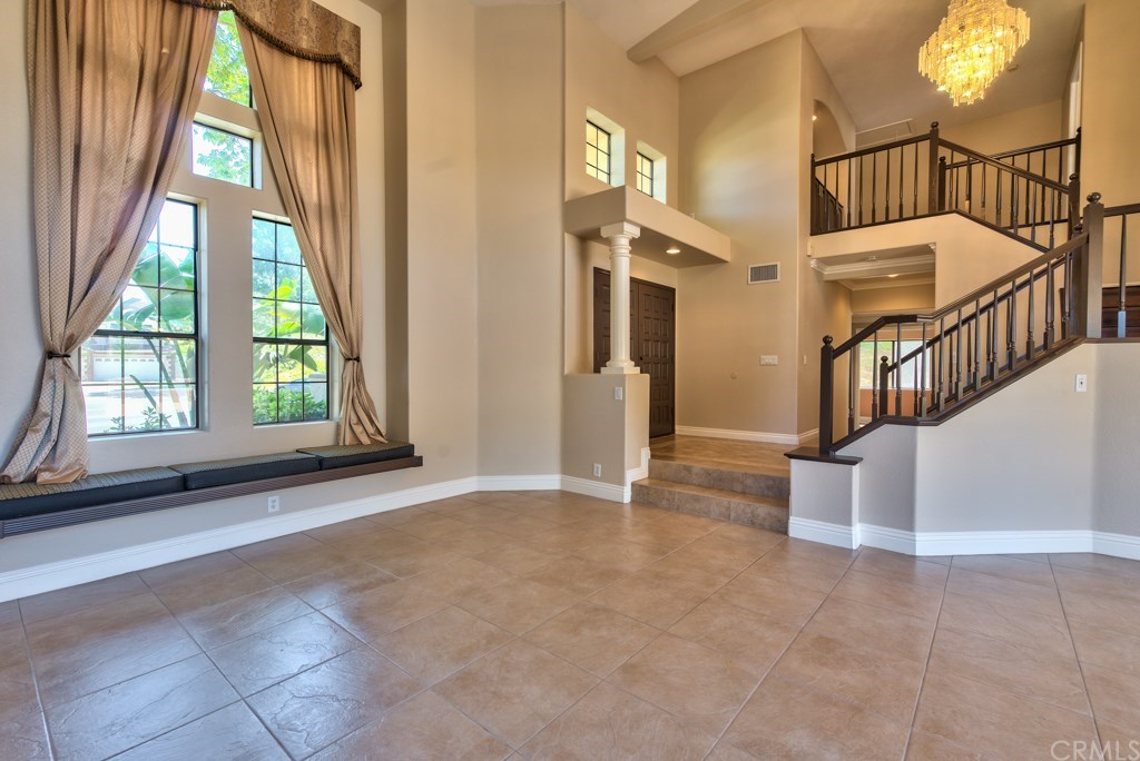 3086 Diamondview Circle Corona, CA 92882 - Photo 28 of 66 Partial views of the living room, the foyer and the staircase.