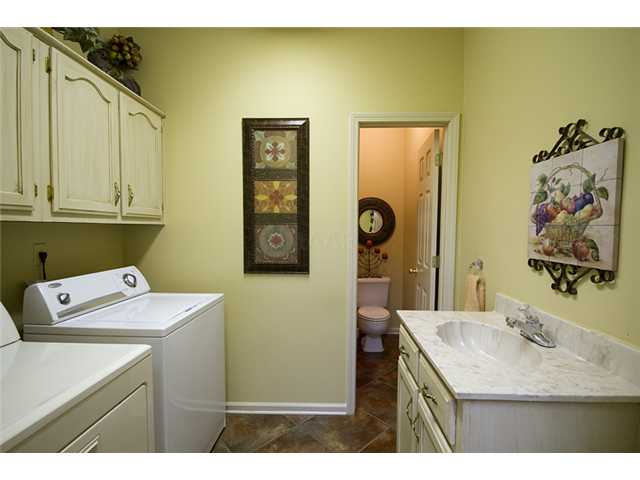 6068 Brunswick Road Lakeland, TN 38002 - Photo 8 of 12 Wonderful laundry room and half bath off kitchen hall.