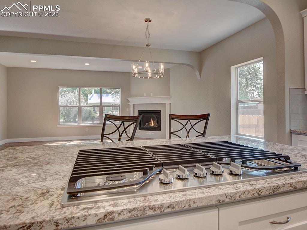 208 Custer Avenue Colorado Springs, CO 80903 - Photo 12 of 36 Upgraded, oversized gas cooktop!