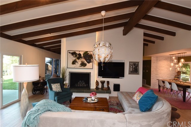 12 Harbor Sight Drive Rolling Hills Estates, CA 90274 - Photo 12 of 56 Another living room view with slider to the back yard, and dining room to the right.