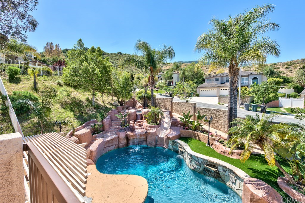 3086 Diamondview Circle Corona, CA 92882 - Photo 21 of 66 Views of the mountains and the backyard can be enjoyed from the master bedroom balcony.