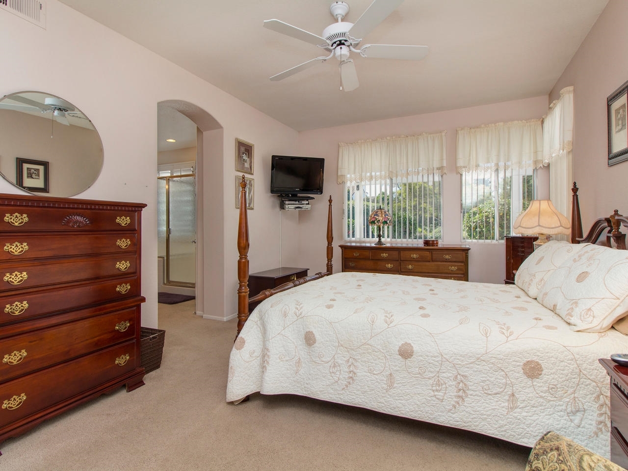 6047 Piros Way Oceanside, CA 92056 - Photo 13 of 25 The Master Suite is conveniently located downstairs with 2 closets (1 sliding closet in the Bedroom as well as a walk-in closet in the Master Bathroom area) and views of your beautiful patio.