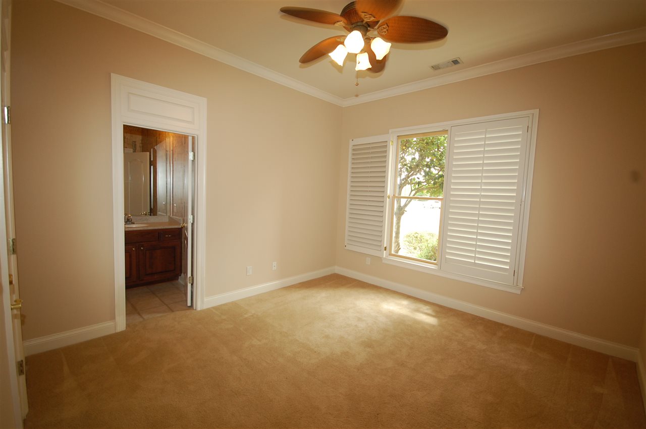 590 Dusk Ridge Road Collierville, TN 38017 - Photo 16 of 25 The ravishing second master bedroom has a private full bathroom and a walk-in closet!