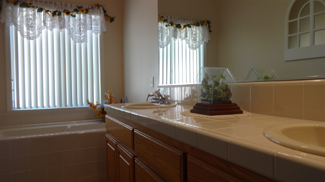 2212 Crest Hill Lane Fallbrook, CA 92028 - Photo 12 of 14 Master bath has dual sinks, glass-enclosed shower and a separate tub.