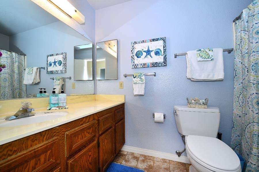 3003 Gayla Court Spring Valley, CA 91978 - Photo 23 of 25 Upstairs hall bathroom serves the secondary bedrooms.