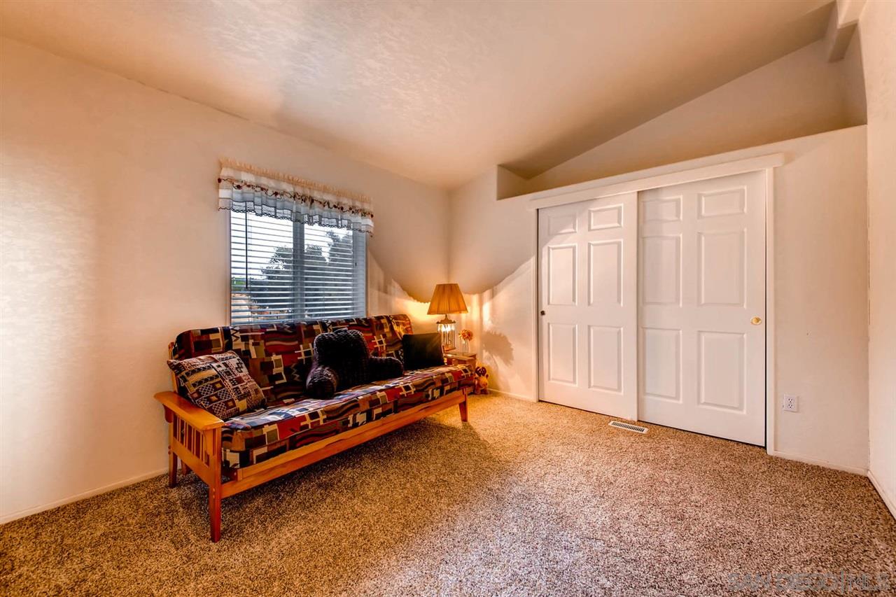 6487 Japatul Highlands Road Alpine, CA 91901 - Photo 22 of 25 3rd bedroom also generously sized with high ceilings.