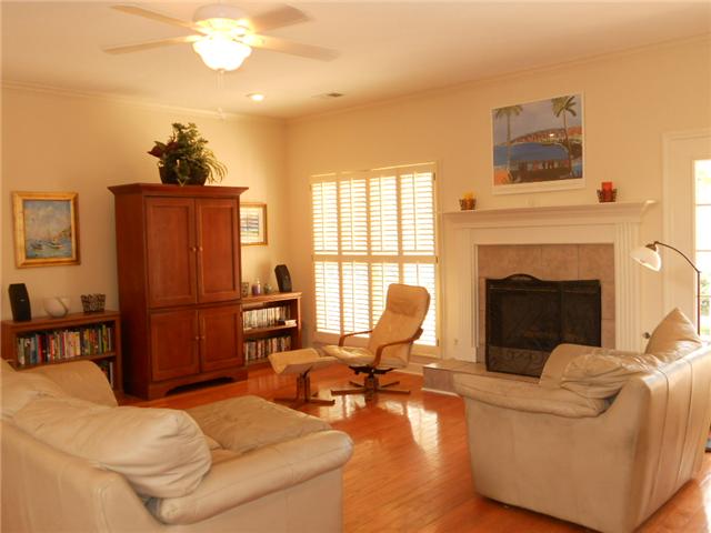 685 Beckett Ridge Cove Collierville, TN 38017 - Photo 2 of 12 Large Great Room with gas fireplace and hardwood floors.