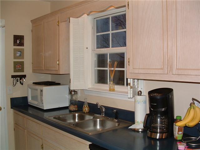 1095 Anderton Road Bell Buckle, TN 37020 - Photo 3 of 7 Another view of kitchen with lots of cabinets.