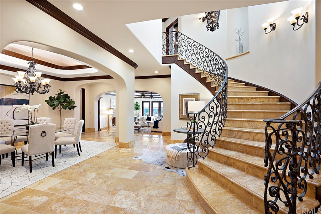 3 Fox Hole Road Ladera Ranch, CA 92694 - Photo 12 of 36 This home is wonderful for entertaining,. Dine with a view of the hills! A dramatic travertine stairway leads to the master suite and two additional bedroom suites and a viewing deck.