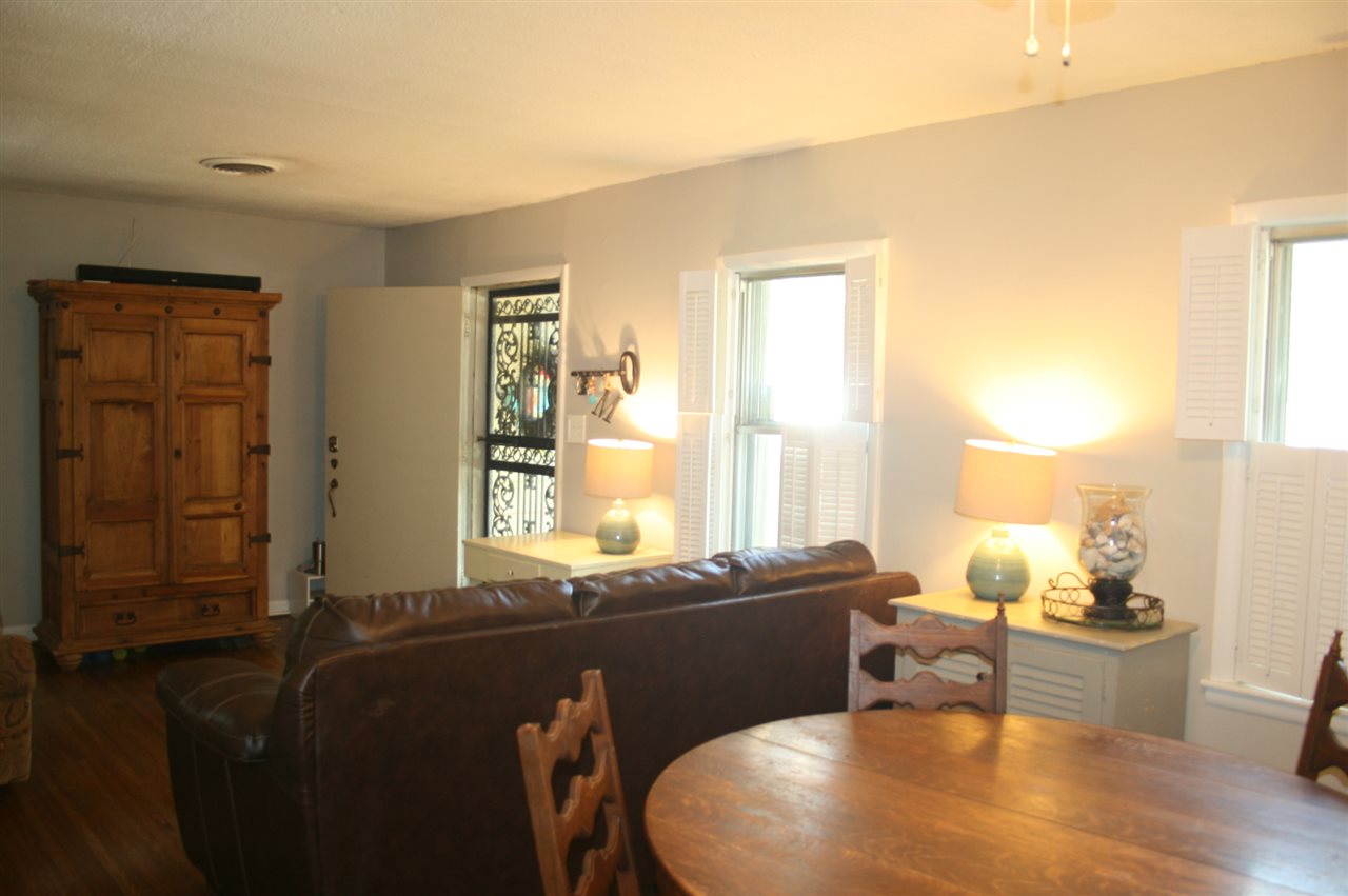4855 Amboy Road Memphis, TN 38117 - Photo 13 of 25 Spacious living and dining room with windows overlooking the front.