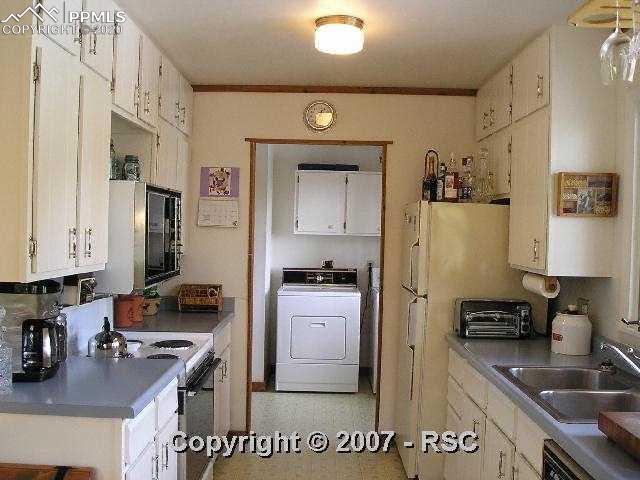 550 Rock Ridge Road Palmer Lake, CO 80133 - Photo 9 of 15 Kitchen