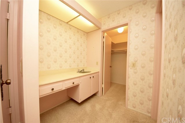 6064 Lawrence Street Cypress, CA 90630 - Photo 10 of 20 Sitting area with sink and walk-in closet off the Master Bath