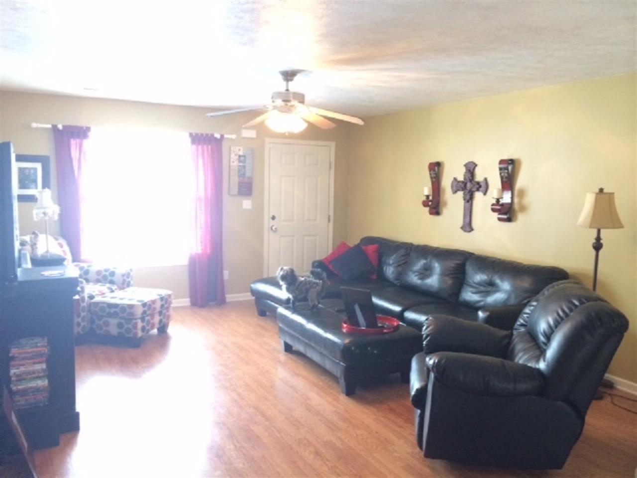 857 Pickens Store Road Mason, TN 38049 - Photo 5 of 12 spacious livingroom with wood laminate flooring