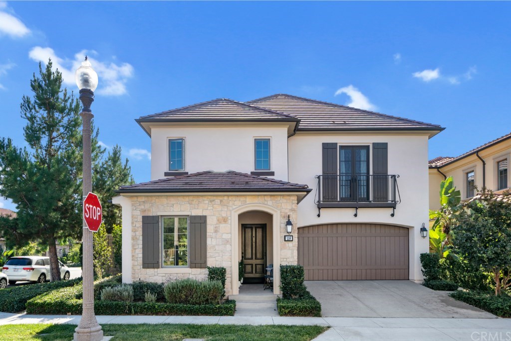 116 Mosswood Irvine, CA 92620 - Photo 34 of 42 A front view of the home and driveway.