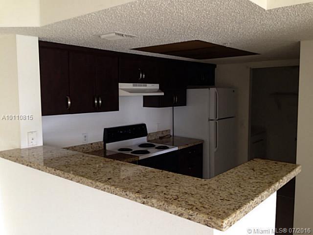 5061 Wiles Road, Unit 102 Coconut Creek, FL 33073 - Photo 2 of 10