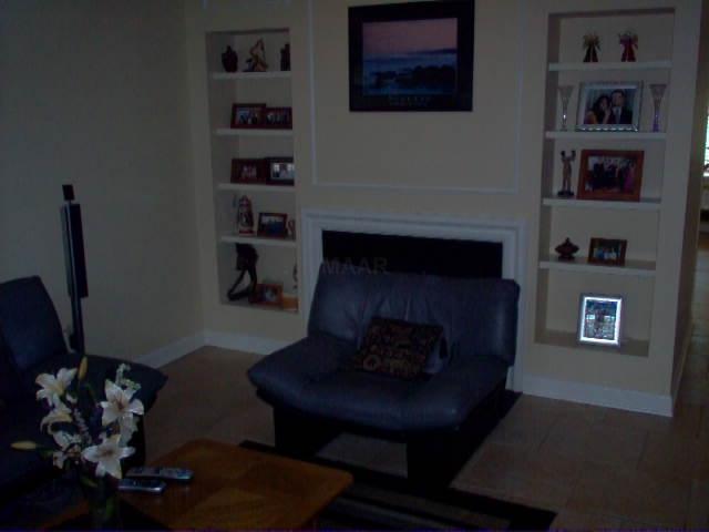 1707 Kimbrough Road, Unit 1707 Germantown, TN 38138 - Photo 6 of 10 View into the living rm..FRPL..Tile floor..Built-ins..