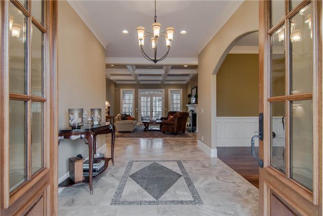 132 Cheek Road Nashville, TN 37205 - Photo 5 of 30 Custom inlaid Storm Travertine Marble abounds in the entry way and living room.
