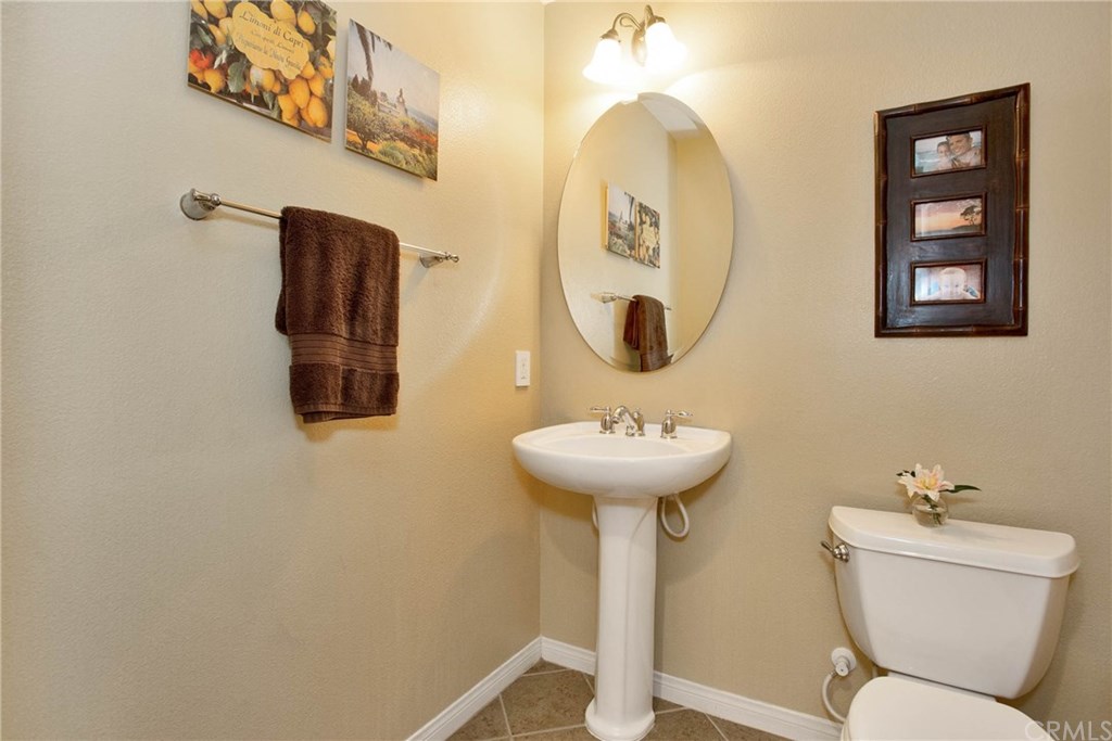 21 Corte Javier San Clemente, CA 92673 - Photo 11 of 30 The main floor powder room offers convenience for family and friends.