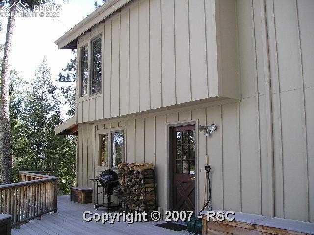 550 Rock Ridge Road Palmer Lake, CO 80133 - Photo 2 of 15 Back View of Home