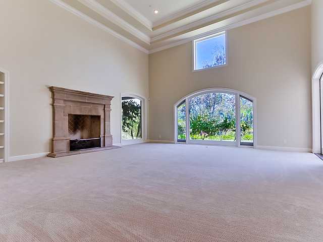 16210 Via Cazadero Rancho Santa Fe, CA 92067 - Photo 4 of 25 Living room with fireplace