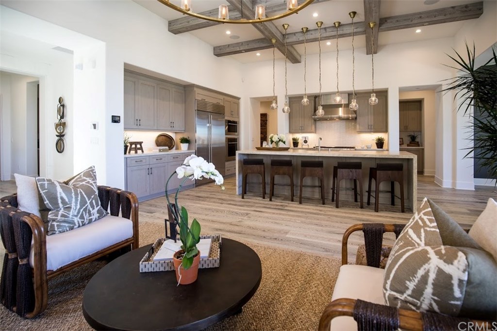 18 Phillips Ranch Road Rolling Hills Estates, CA 90274 - Photo 11 of 12 A2 model home, same floorplan as the home being built at 18 Phillips Ranch Road. This is the view from the great room into the kitchen.