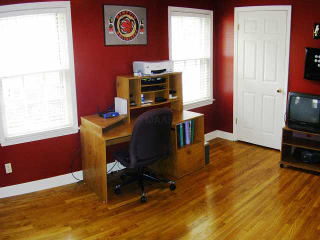 5039 Princeton Road Memphis, TN 38117 - Photo 9 of 12 This is the third bedroom that is currently being used as an office. It has two closets. Plenty of natural light enters this corner room with its three windows.