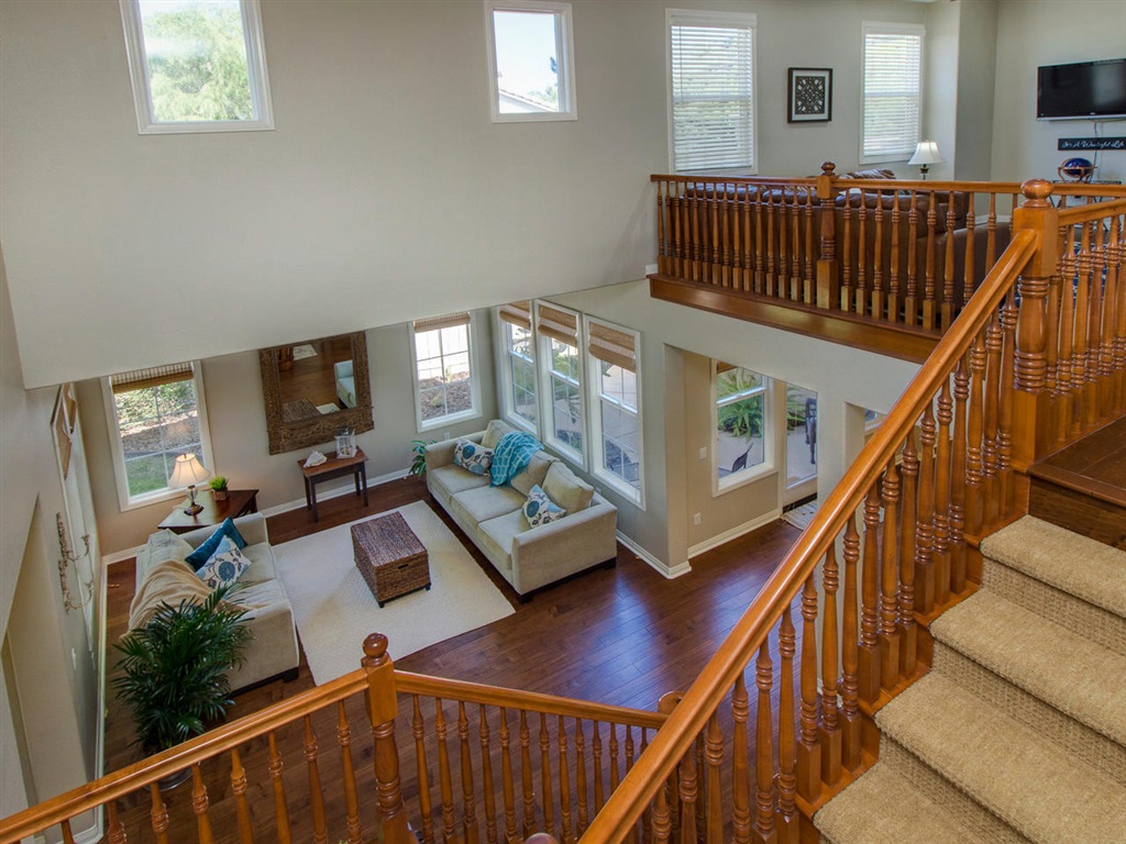 1267 Mariposa Road Carlsbad, CA 92011 - Photo 11 of 25 Another view of the entry and stunning staircase. The home boasts upgraded carpet.