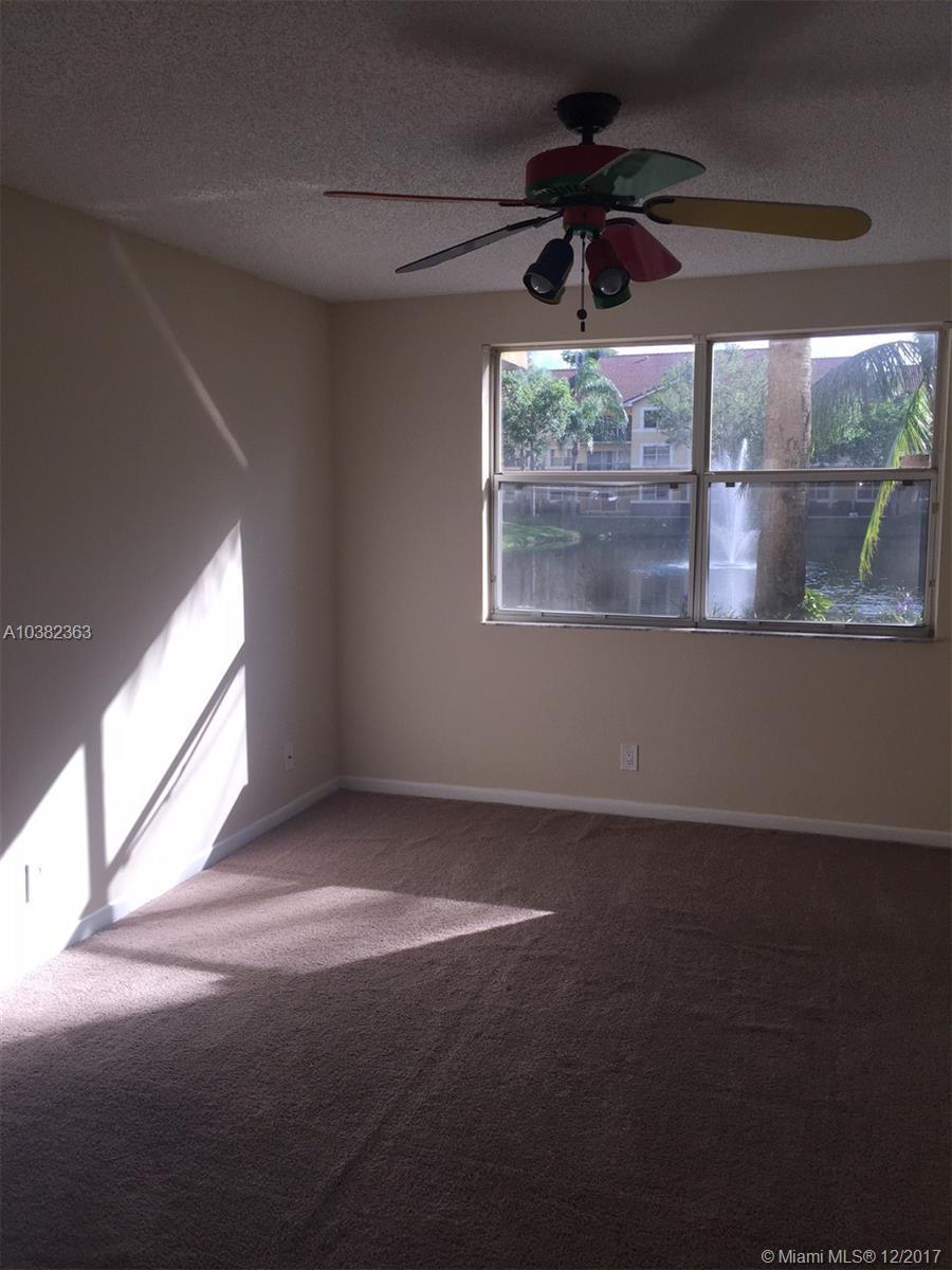 8891 Wiles Road, Unit 106 Coral Springs, FL 33067 - Photo 3 of 10