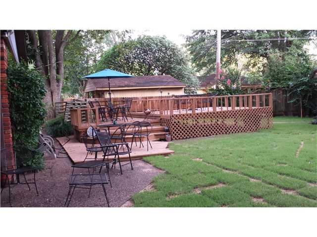 4903 Helene Road Memphis, TN 38117 - Photo 22 of 25 3 tier deck and patio. Back and front yards have Zoysia grass