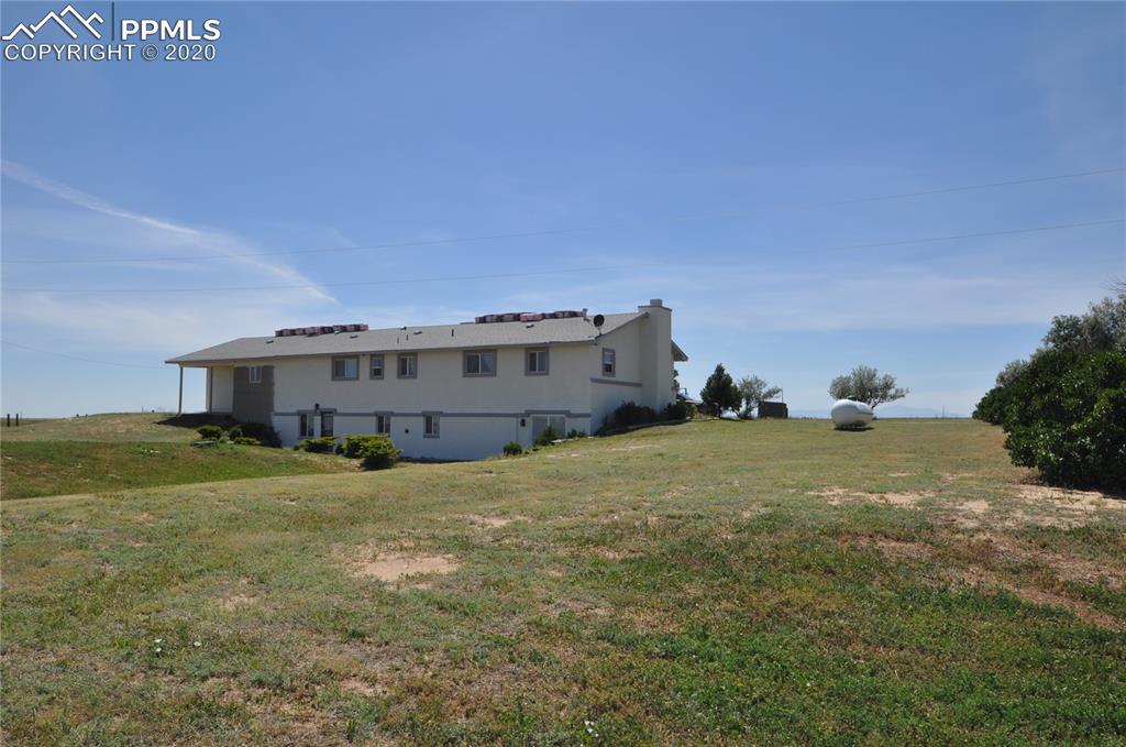 36825 East Jones Road Yoder, CO 80864 - Photo 27 of 36 Back of the house view. You can see the shingles on the roof ready to be installed :)